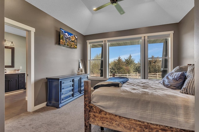 8619 State Highway 55 NW, Annandale, MN 55302 - carpeted bedroom featuring a ceiling fan, baseboards, vaulted ceiling, and ensuite bath