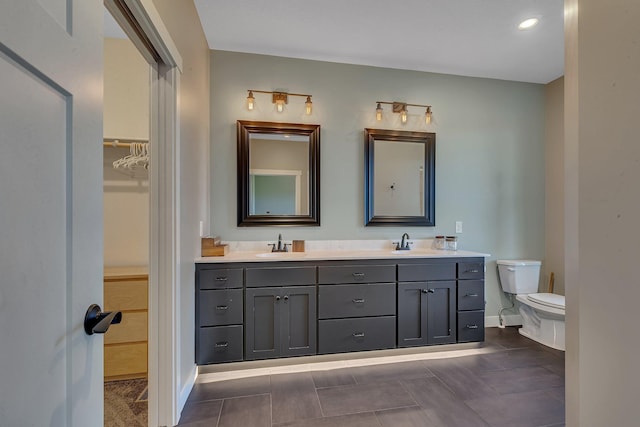 8619 State Highway 55 NW, Annandale, MN 55302 - bathroom with a sink, baseboards, toilet, and double vanity