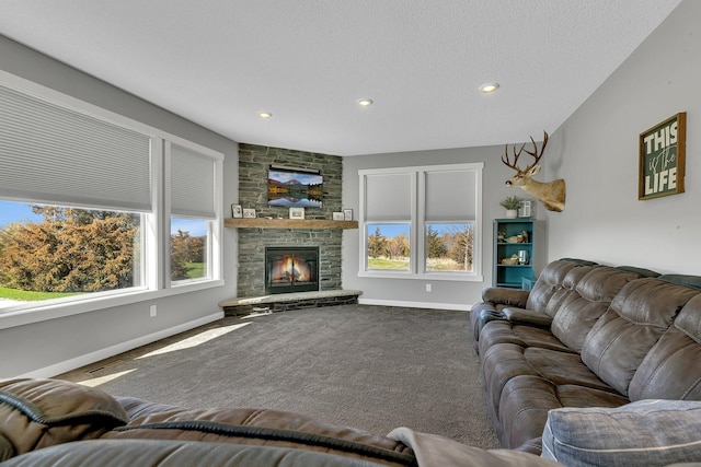 8619 State Highway 55 NW, Annandale, MN 55302 - living area with carpet floors, baseboards, a fireplace, and recessed lighting