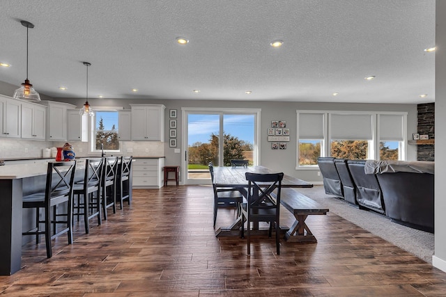 8619 State Highway 55 NW, Annandale, MN 55302 - dining space featuring recessed lighting, a textured ceiling, and a wealth of natural light