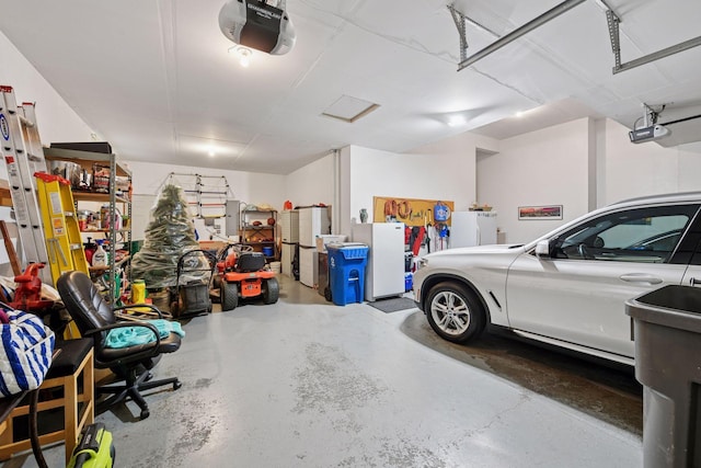 garage featuring a garage door opener