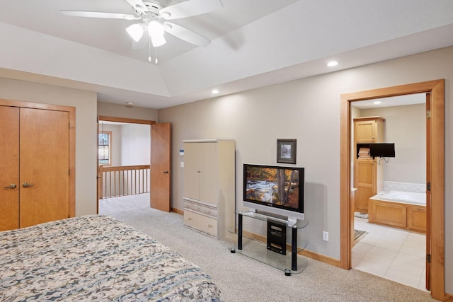 bedroom featuring carpet flooring, ensuite bath, recessed lighting, a ceiling fan, and a closet