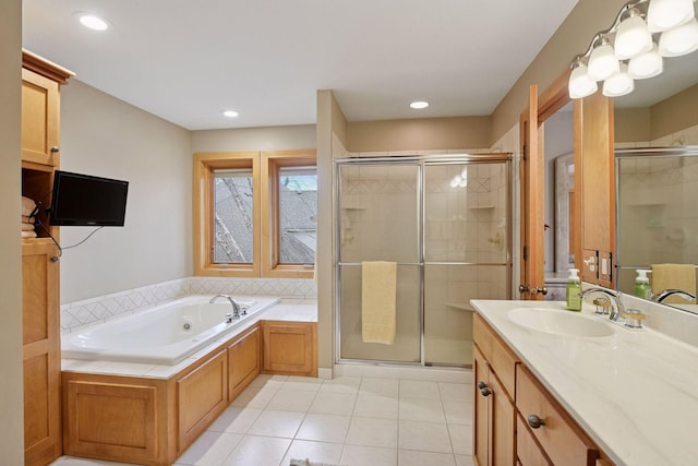 full bathroom with vanity, tile patterned floors, a whirlpool tub, and a stall shower