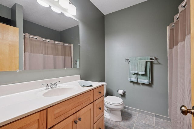 full bathroom featuring vanity, baseboards, toilet, and curtained shower