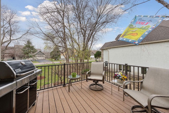 wooden terrace with grilling area