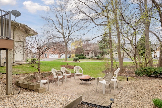 view of patio with an outdoor fire pit