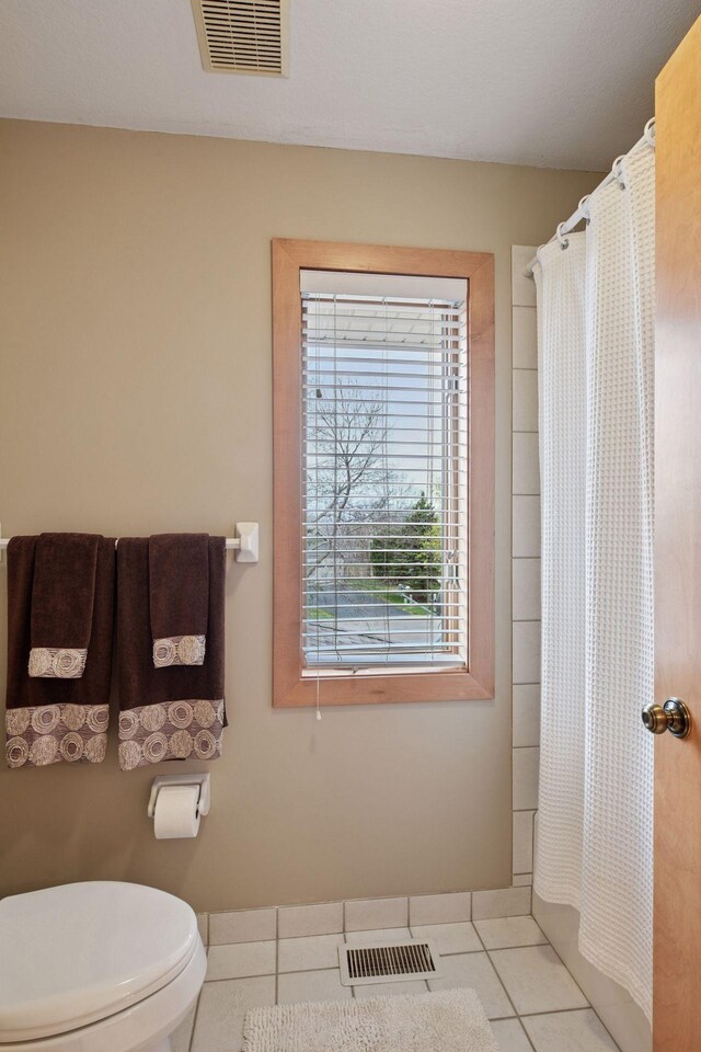 3670 Yuma Ln N, Plymouth, MN 55446 - bathroom with tile patterned floors and a shower with curtain