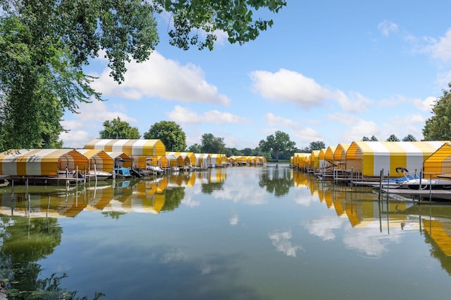 view of water feature featuring boat lift and a dock