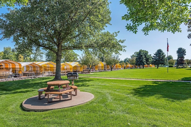 view of home's community featuring a yard