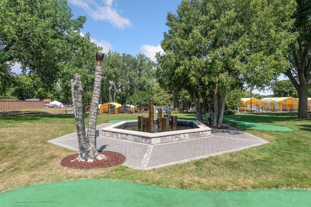 view of yard with a playground and fence