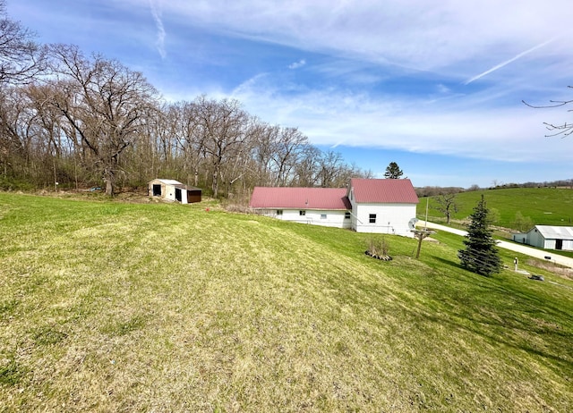 27227 Raven Rd, Spring Valley, MN 55975 - view of yard featuring a shed and an outbuilding