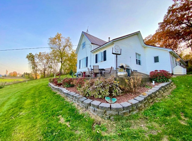 27227 Raven Rd, Spring Valley, MN 55975 - back of house featuring a lawn and metal roof