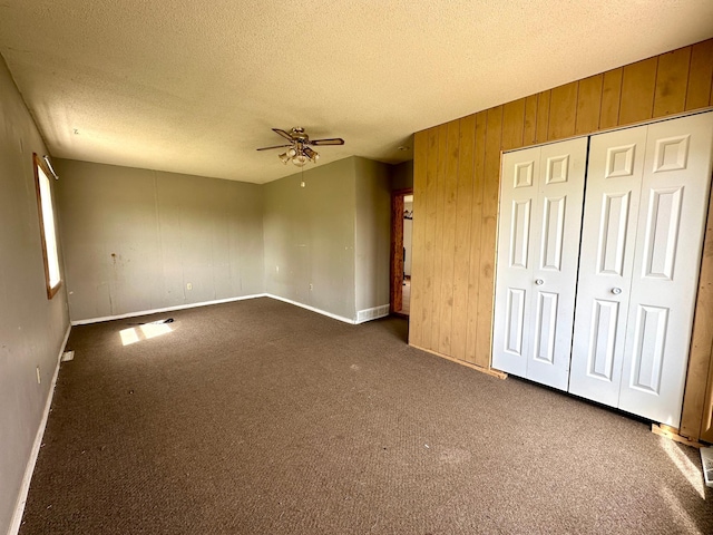 27227 Raven Rd, Spring Valley, MN 55975 - interior space featuring baseboards, a textured ceiling, and ceiling fan