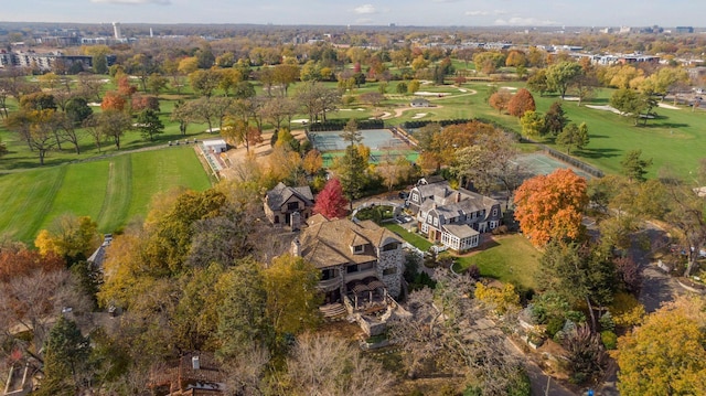 birds eye view of property with view of golf course