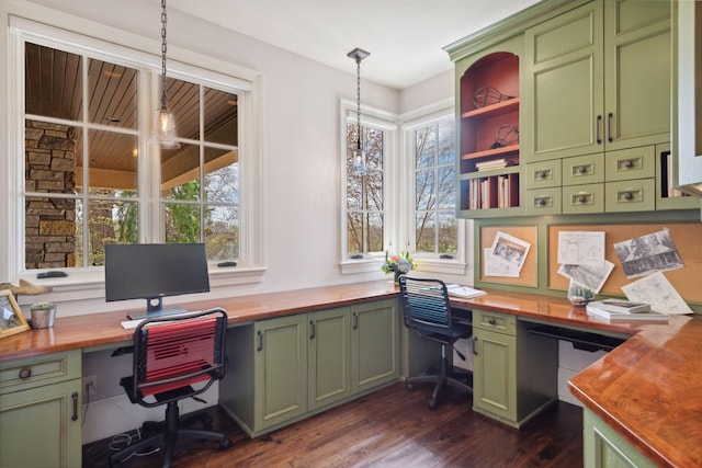 office space with dark wood-style floors and built in desk