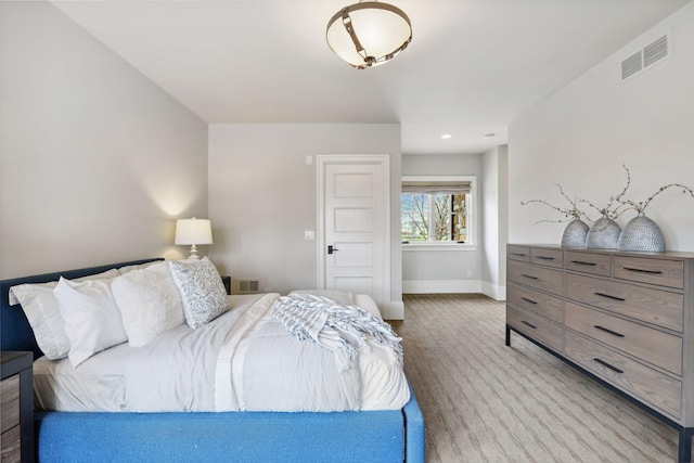 carpeted bedroom with recessed lighting, baseboards, and visible vents