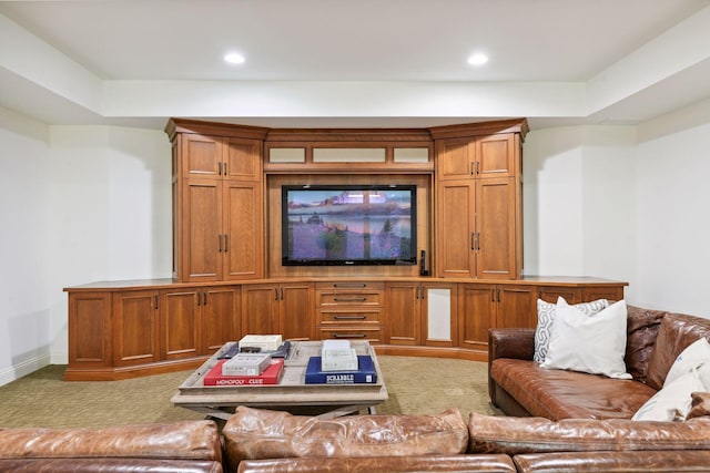 living room with light colored carpet and recessed lighting