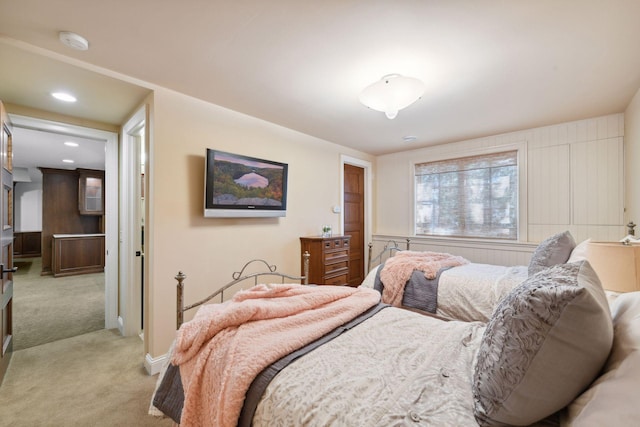 bedroom featuring recessed lighting and light carpet