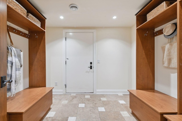mudroom featuring baseboards and recessed lighting