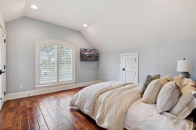 bedroom with dark wood-style flooring, baseboards, vaulted ceiling, and recessed lighting