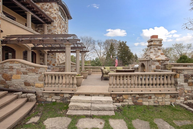 view of community featuring a patio area and a pergola