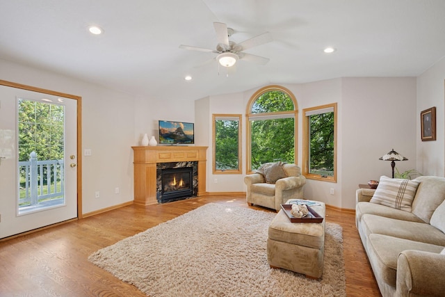 220 Willow Ln, Foley, MN 56329 - living room featuring ceiling fan, light wood-style flooring, recessed lighting, a fireplace, and lofted ceiling