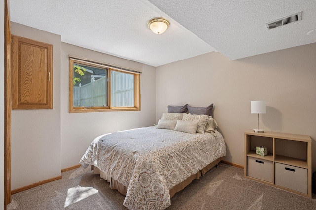 220 Willow Ln, Foley, MN 56329 - carpeted bedroom featuring baseboards and a textured ceiling