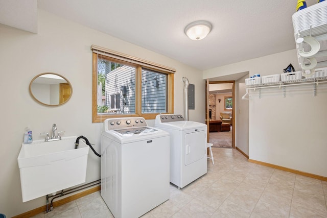 220 Willow Ln, Foley, MN 56329 - laundry area with independent washer and dryer and electric panel