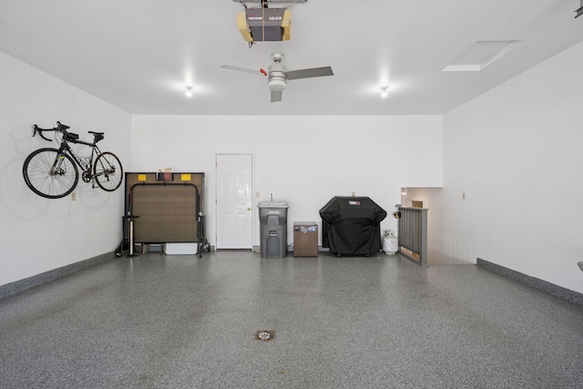 220 Willow Ln, Foley, MN 56329 - garage with a garage door opener and ceiling fan