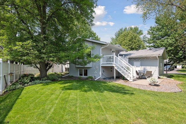 220 Willow Ln, Foley, MN 56329 - rear view of property with stairs, a patio area, and a deck
