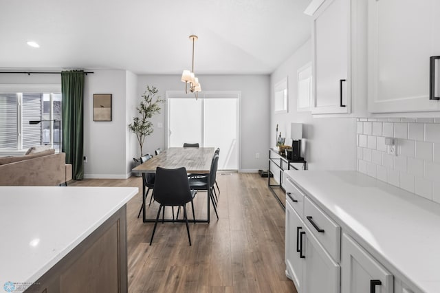 3682 Merrifield Dr S, Fargo, ND 58104 - dining space featuring wood finished floors, baseboards, and recessed lighting