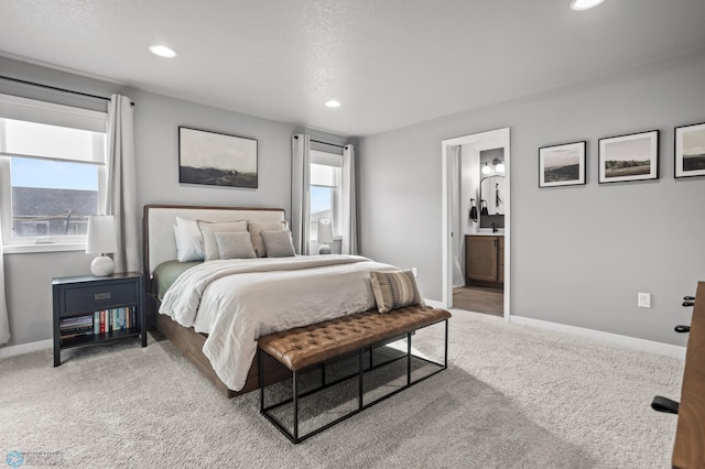 3682 Merrifield Dr S, Fargo, ND 58104 - carpeted bedroom with recessed lighting, baseboards, and connected bathroom