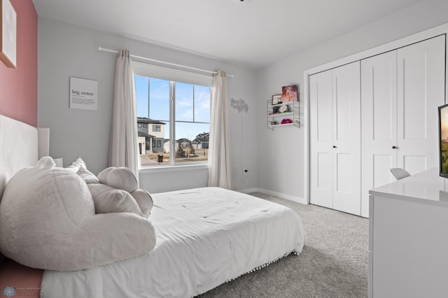3682 Merrifield Dr S, Fargo, ND 58104 - bedroom with carpet, a closet, and baseboards