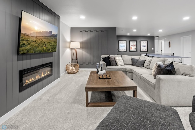 3682 Merrifield Dr S, Fargo, ND 58104 - living area with recessed lighting, light carpet, a fireplace, and baseboards
