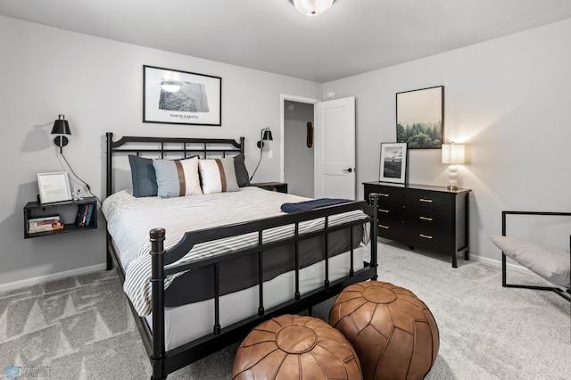 3682 Merrifield Dr S, Fargo, ND 58104 - bedroom featuring light carpet and baseboards