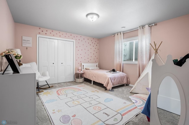 3682 Merrifield Dr S, Fargo, ND 58104 - carpeted bedroom featuring a closet and wallpapered walls