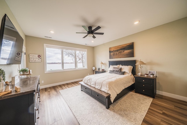 17292 Boyer Lake Rd, Lake Park, MN 56554 - bedroom featuring baseboards, a ceiling fan, wood finished floors, and visible vents