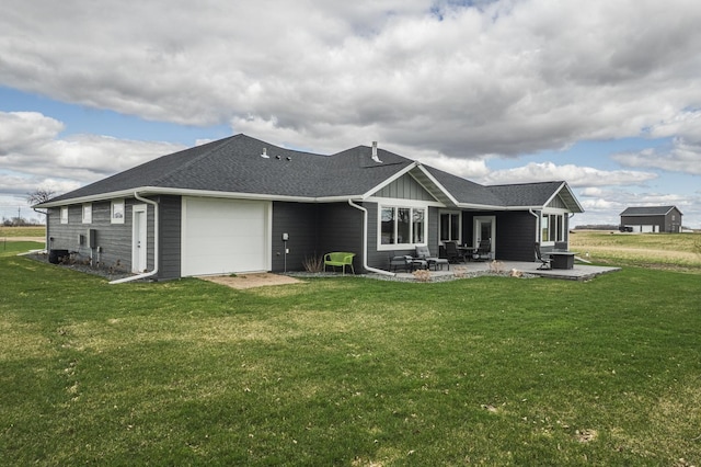 17292 Boyer Lake Rd, Lake Park, MN 56554 - back of house featuring a yard, a patio, an attached garage, and board and batten siding