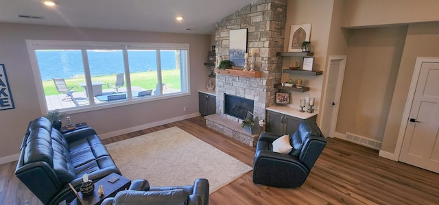17292 Boyer Lake Rd, Lake Park, MN 56554 - living room featuring baseboards, visible vents, wood finished floors, and a fireplace