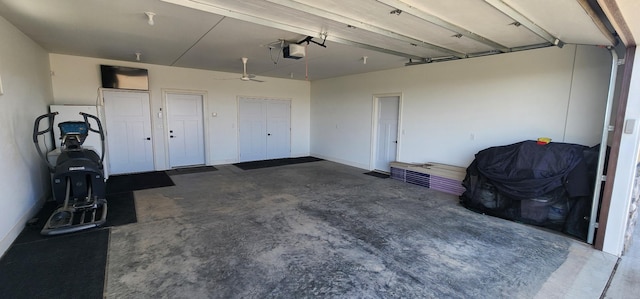 17292 Boyer Lake Rd, Lake Park, MN 56554 - garage featuring a garage door opener and a ceiling fan