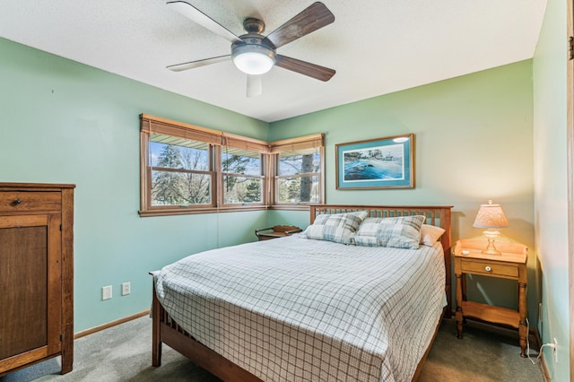 bedroom with carpet floors, baseboards, and a ceiling fan