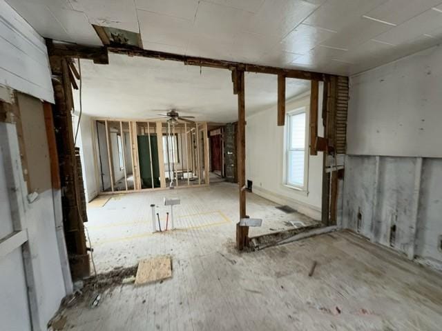 interior space featuring a ceiling fan