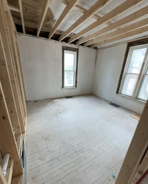 unfurnished room featuring light wood-style flooring