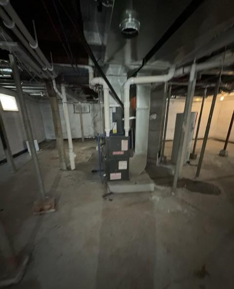 128 4th St NW, Aitkin, MN 56431 - unfinished basement featuring heating unit