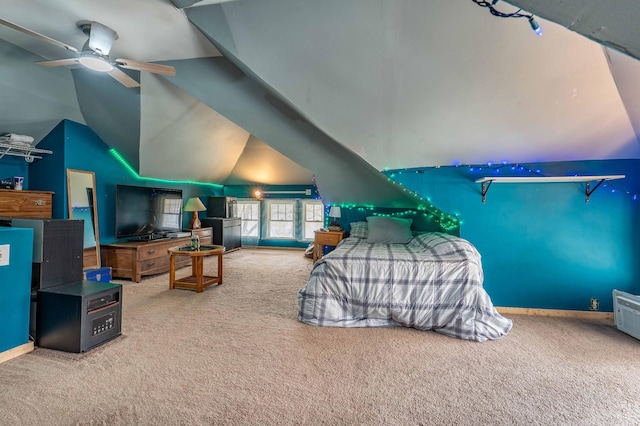 bedroom featuring baseboards, vaulted ceiling, and carpet