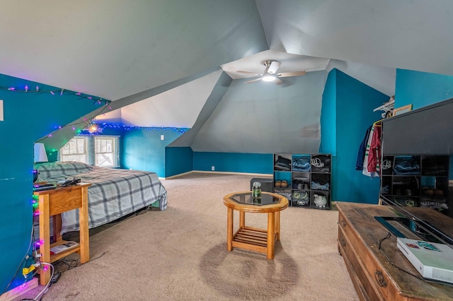 bedroom with carpet, ceiling fan, and vaulted ceiling