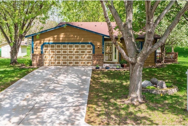 single story home featuring brick siding, a garage, and a front yard