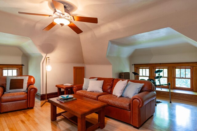 1043 Lincoln Ave, Saint Paul, MN 55105 - living room featuring healthy amount of natural light, light wood-style flooring, vaulted ceiling, and ceiling fan