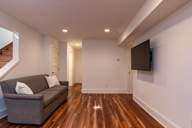 1043 Lincoln Ave, Saint Paul, MN 55105 - living area with dark wood-style flooring, baseboards, recessed lighting, and stairway