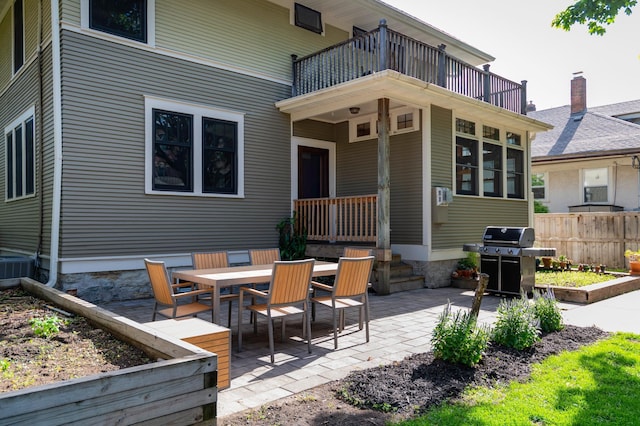 1043 Lincoln Ave, Saint Paul, MN 55105 - view of patio featuring a balcony, a grill, and central air condition unit